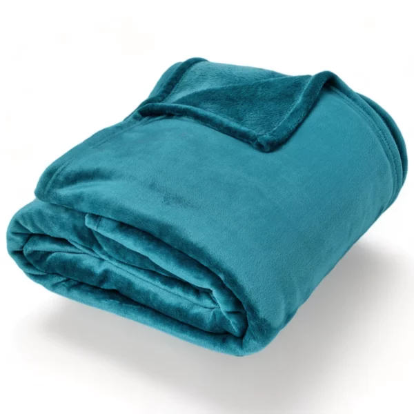 Plaid en microvelours bleu turquoise plié de la marque Litex, symbole de confort.